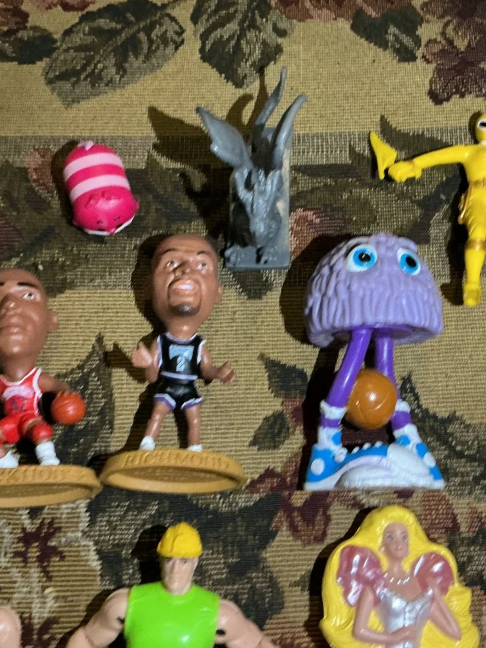 32 Miscellaneous small Toy lot with NBA Bionicle looney tune barbie and more